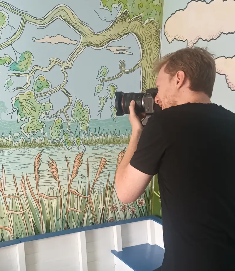 Richard photographing on location with his camera